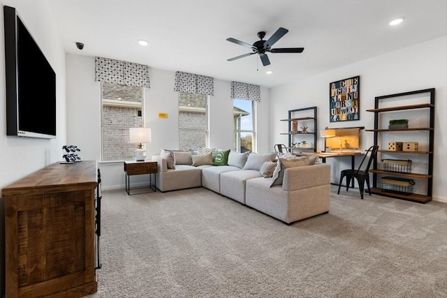 living area featuring carpet flooring, a ceiling fan, recessed lighting, and baseboards