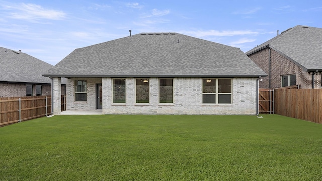 1906 Bobbin Ml, Forney, TX 75126 - back of property with roof with shingles, a patio area, and brick siding
