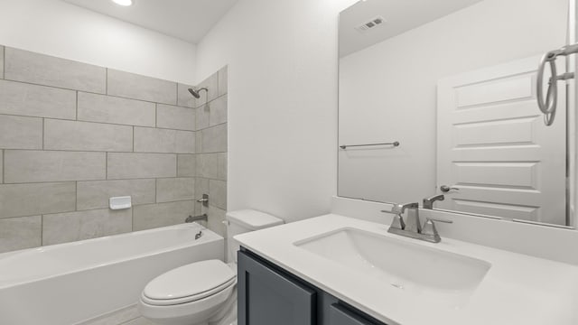 1906 Bobbin Ml, Forney, TX 75126 - bathroom with toilet, vanity, and shower / bath combination