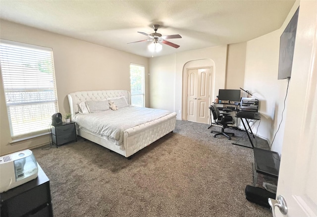 bedroom featuring carpet flooring, a desk, and ceiling fan