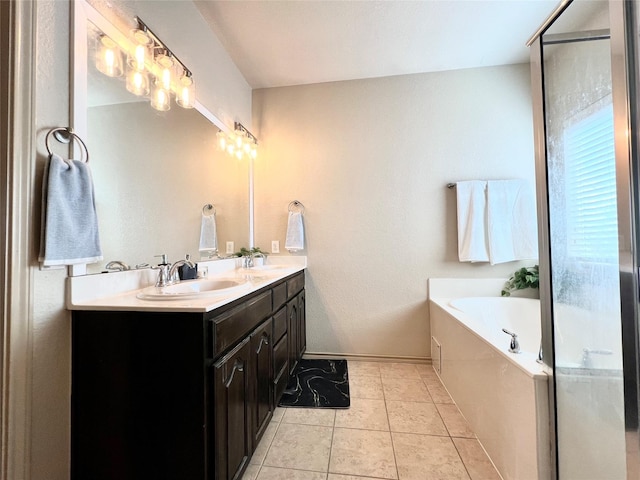 full bathroom featuring double vanity, a garden tub, tile patterned flooring, baseboards, and a shower with shower door