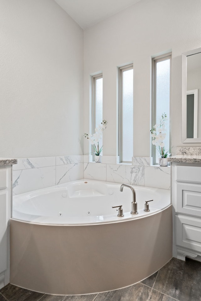 720 Waterbrook Pkwy, Argyle, TX 76226 - full bathroom featuring vanity and a tub with jets