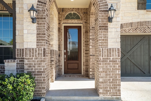 720 Waterbrook Pkwy, Argyle, TX 76226 - doorway to property with brick siding and stone siding