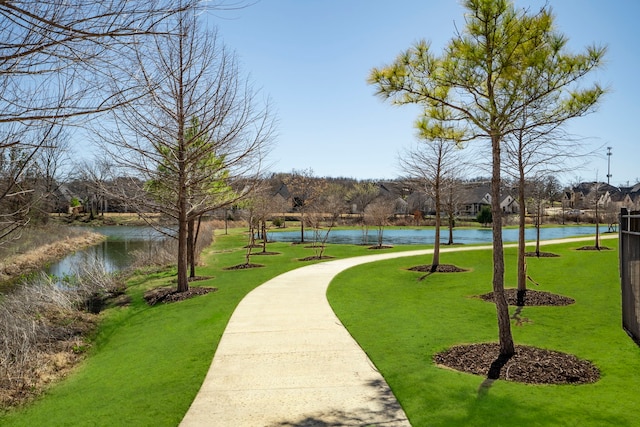 720 Waterbrook Pkwy, Argyle, TX 76226 - view of property's community with a water view and a lawn