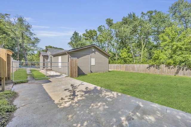 1213 E Laurel St, Tyler, TX 75702 - view of yard featuring a gate and an outdoor structure