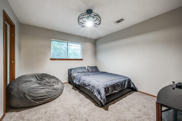 2708 Winchester Ct, Denton, TX 76209 - bedroom featuring carpet flooring, baseboards, and a textured ceiling