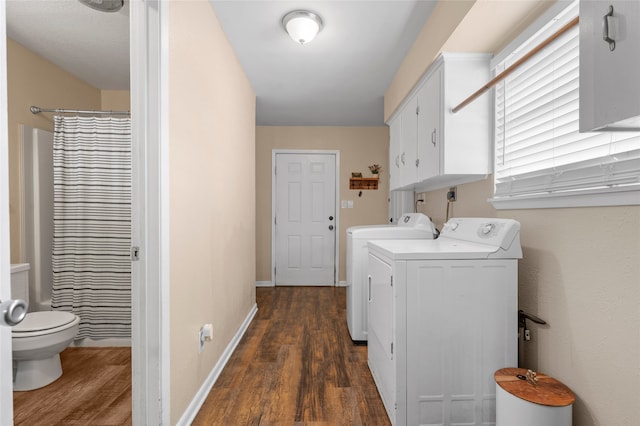 163 Private Road 605, Marlin, TX 76661 - laundry room with washing machine and dryer, dark wood-style floors, and baseboards
