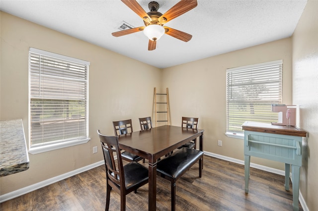 163 Private Road 605, Marlin, TX 76661 - dining room featuring wood finished floors, ceiling fan, and baseboards