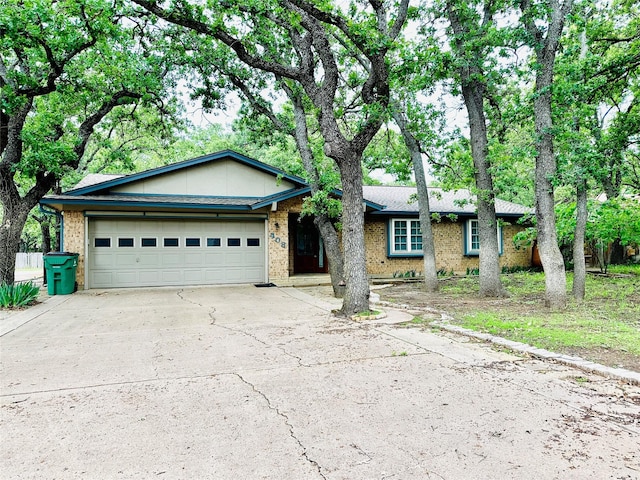 408 Briarwood Dr, Eastland, TX 76448 - ranch-style home featuring driveway, a garage, and brick siding