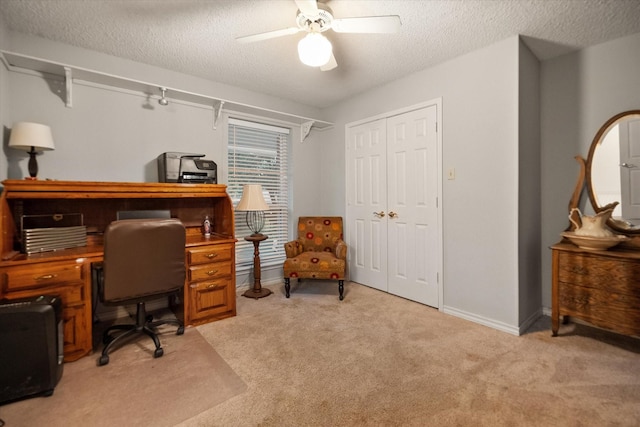 2608 Rivercrest Dr, Arlington, TX 76006 - office space with a textured ceiling, light colored carpet, ceiling fan, and baseboards