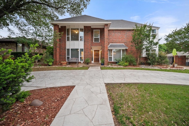 2608 Rivercrest Dr, Arlington, TX 76006 - view of front of property with brick siding and a shingled roof