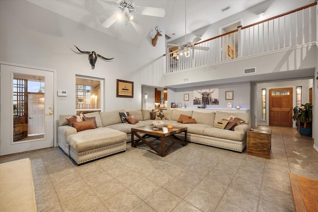 2608 Rivercrest Dr, Arlington, TX 76006 - tiled living area featuring a ceiling fan and a towering ceiling