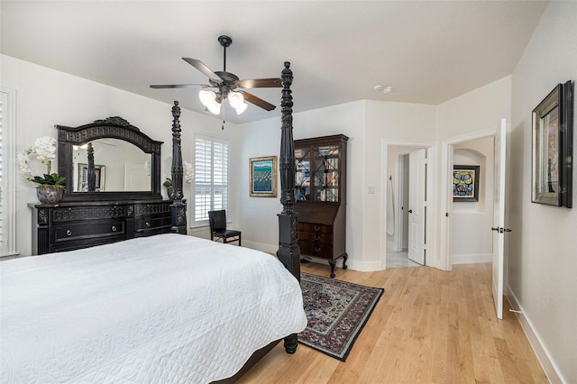 4920 Ridge Cir, Benbrook, TX 76126 - bedroom with light wood-type flooring, baseboards, and ceiling fan