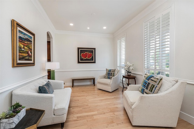 4920 Ridge Cir, Benbrook, TX 76126 - sitting room featuring ornamental molding, light wood finished floors, recessed lighting, and arched walkways