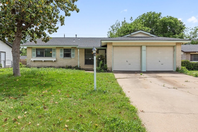 720 Oceanview Dr, Dallas, TX 75232 - ranch-style house with brick siding, concrete driveway, a front yard, a garage, and a shingled roof