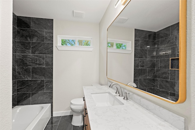 5101 Penrod Ct, River Oaks, TX 76114 - full bath featuring baseboards, vanity, healthy amount of natural light, and toilet