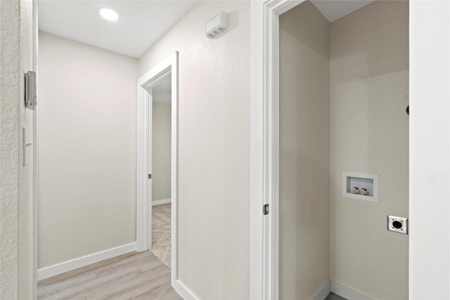 5101 Penrod Ct, River Oaks, TX 76114 - washroom with hookup for an electric dryer, washer hookup, light wood-type flooring, and baseboards