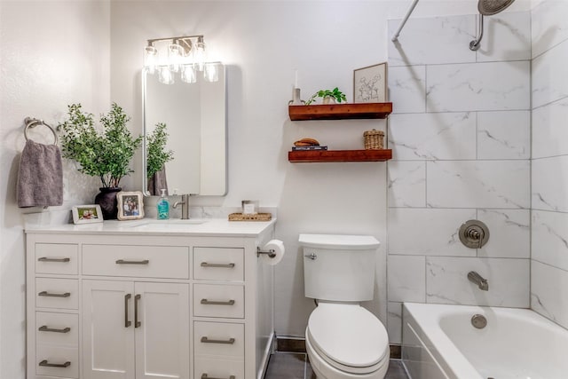 bathroom featuring toilet, vanity, and shower / bathtub combination