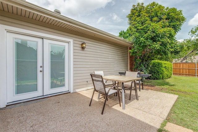 view of patio / terrace featuring outdoor dining space and french doors