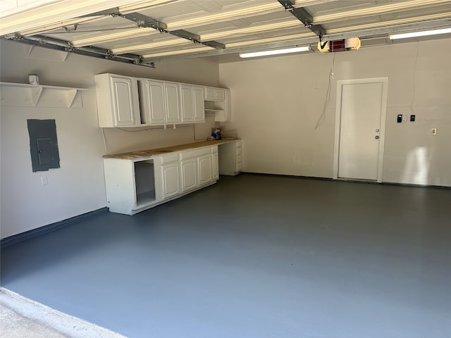 8594 Creekview Dr, Frisco, TX 75034 - garage featuring electric panel and a garage door opener