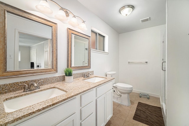 full bath featuring toilet, tile patterned flooring, baseboards, double vanity, and a shower with shower door