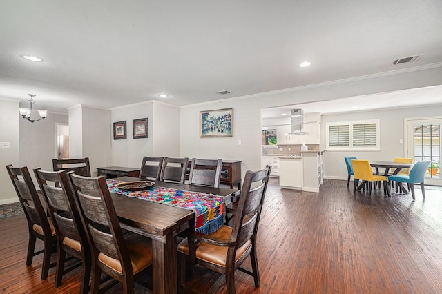 dining space featuring dark wood-style floors, ornamental molding, a chandelier, recessed lighting, and baseboards
