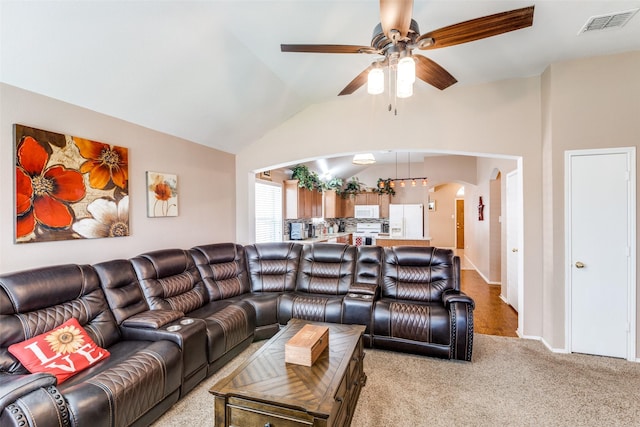 4012 Summerhill Ln, Fort Worth, TX 76244 - living room featuring arched walkways, a ceiling fan, lofted ceiling, light carpet, and baseboards