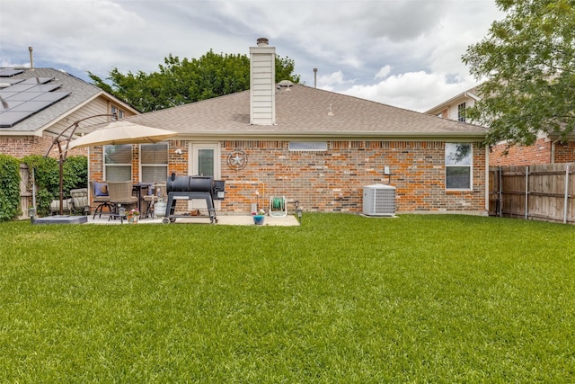 4012 Summerhill Ln, Fort Worth, TX 76244 - rear view of property featuring a patio, a chimney, central air condition unit, and brick siding