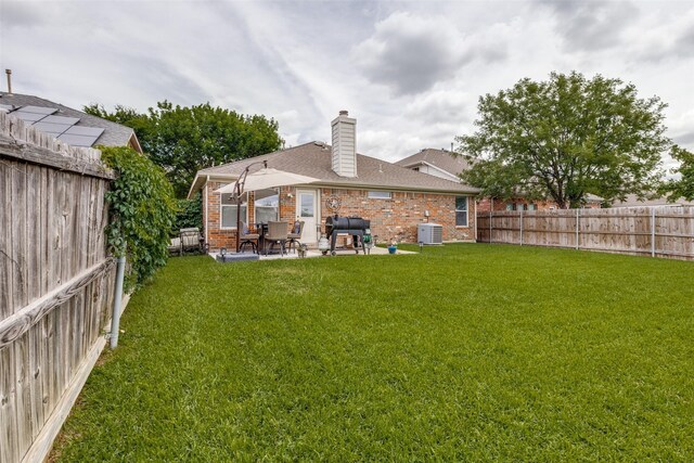 4012 Summerhill Ln, Fort Worth, TX 76244 - back of property with brick siding, a chimney, a patio, cooling unit, and a shingled roof