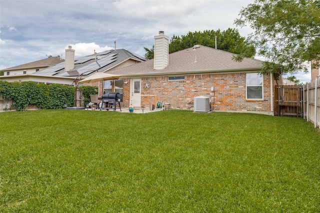 4012 Summerhill Ln, Fort Worth, TX 76244 - rear view of house with a patio, brick siding, cooling unit, a chimney, and roof with shingles