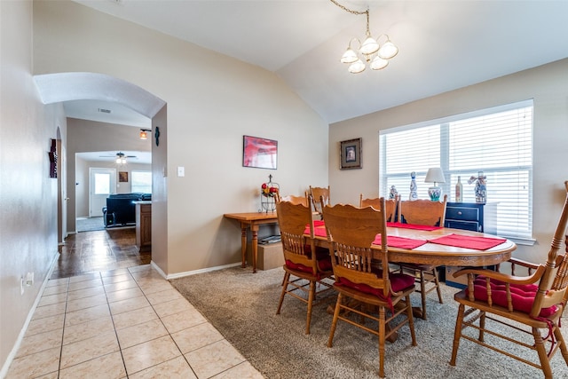 4012 Summerhill Ln, Fort Worth, TX 76244 - dining room with vaulted ceiling, arched walkways, light tile patterned flooring, healthy amount of natural light, and baseboards