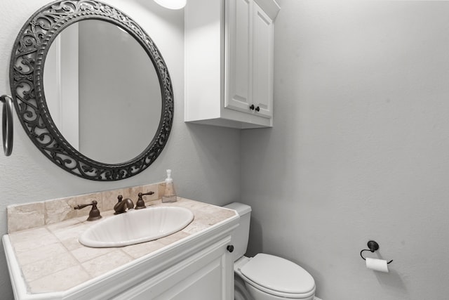 half bath with toilet and vanity