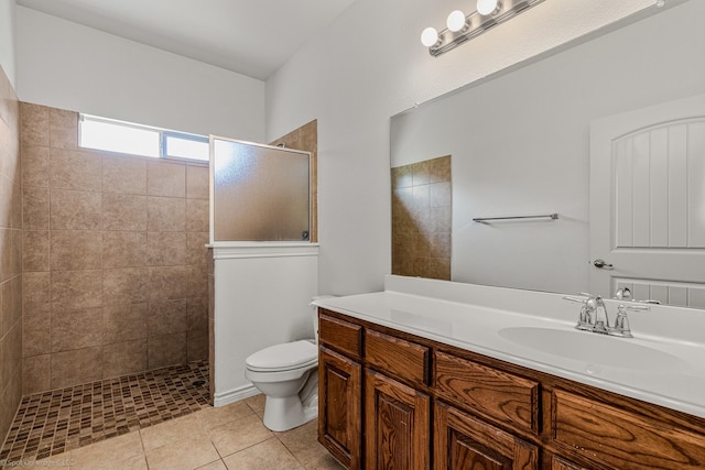 1837 Trail Dr, Rockwall, TX 75087 - bathroom with walk in shower, toilet, vanity, and tile patterned floors