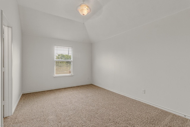 1837 Trail Dr, Rockwall, TX 75087 - carpeted spare room featuring baseboards and lofted ceiling