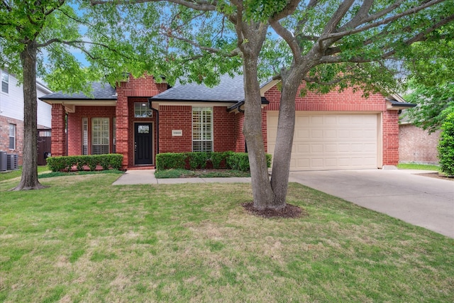 11968 Cobblestone Dr, Frisco, TX 75035 - view of front facade with concrete driveway, roof with shingles, a garage, and brick siding