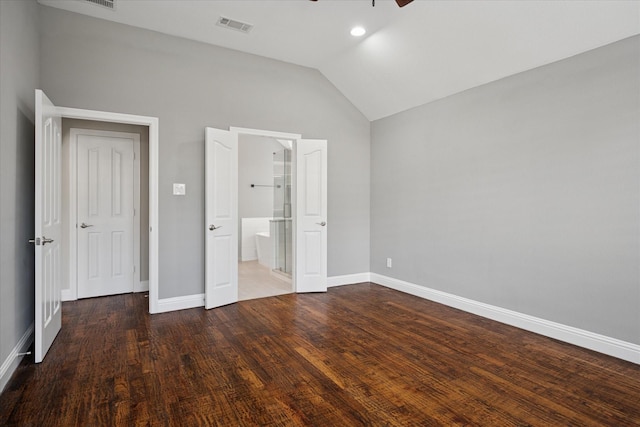 11968 Cobblestone Dr, Frisco, TX 75035 - unfurnished bedroom featuring vaulted ceiling, baseboards, wood finished floors, connected bathroom, and a ceiling fan