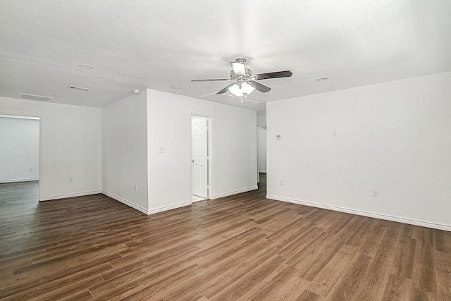 1021 Pangburn St, Grand Prairie, TX 75051 - spare room featuring a ceiling fan, wood finished floors, and baseboards