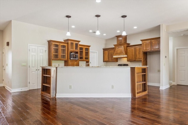 3439 Willow Branch Rd, Mcgregor, TX 76657 - kitchen with brown cabinets, open shelves, dark wood-style flooring, and recessed lighting