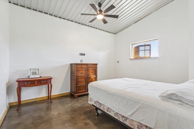 3439 Willow Branch Rd, Mcgregor, TX 76657 - bedroom featuring concrete flooring, baseboards, vaulted ceiling, and a ceiling fan