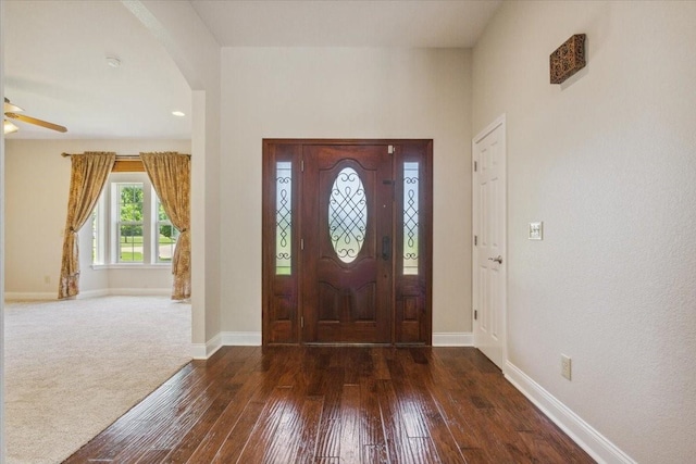 3439 Willow Branch Rd, Mcgregor, TX 76657 - entrance foyer with hardwood / wood-style floors, baseboards, arched walkways, and ceiling fan