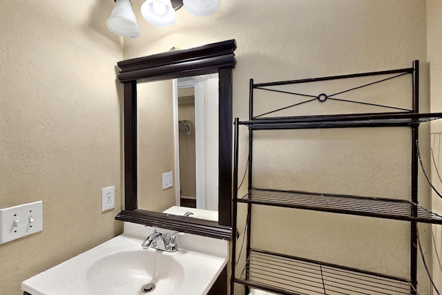 1523 Allen Dr, Cedar Hill, TX 75104 - bathroom with a sink and a textured wall