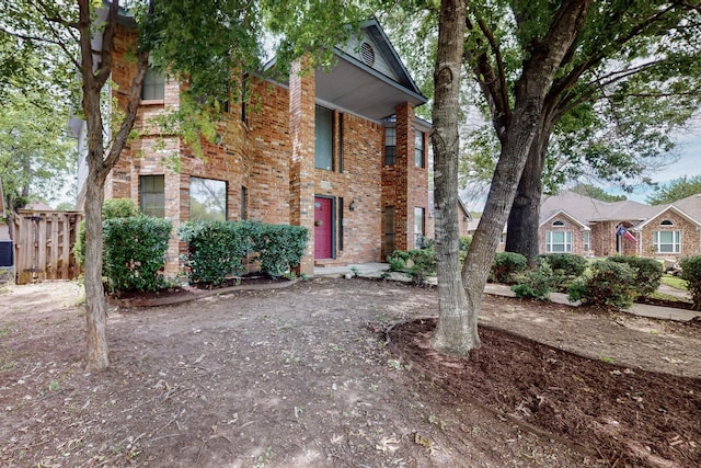 1523 Allen Dr, Cedar Hill, TX 75104 - view of front facade with brick siding and fence
