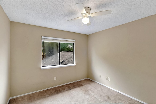 1523 Allen Dr, Cedar Hill, TX 75104 - carpeted spare room with baseboards, ceiling fan, and a textured ceiling