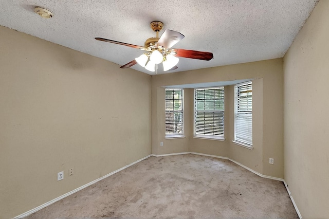 1523 Allen Dr, Cedar Hill, TX 75104 - carpeted empty room featuring a textured ceiling, baseboards, a ceiling fan, and a smoke detector