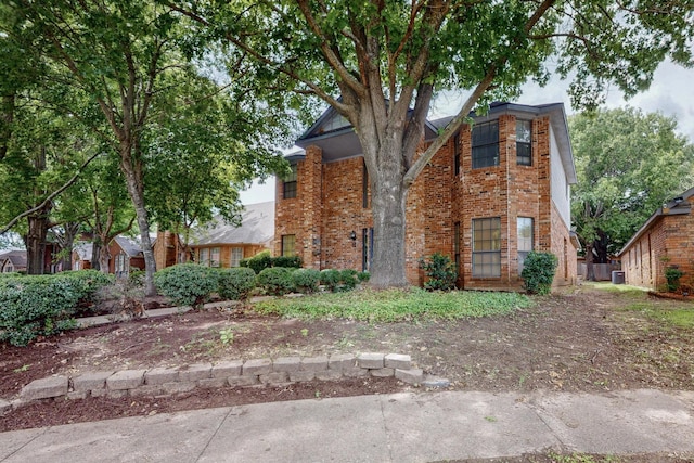 1523 Allen Dr, Cedar Hill, TX 75104 - view of front of property featuring brick siding and central AC