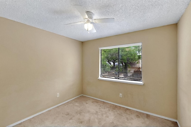 1523 Allen Dr, Cedar Hill, TX 75104 - carpeted empty room with baseboards, ceiling fan, and a textured ceiling