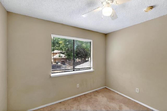1523 Allen Dr, Cedar Hill, TX 75104 - unfurnished room featuring carpet floors, a smoke detector, a ceiling fan, baseboards, and a textured ceiling