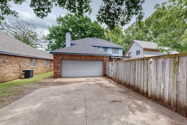 1523 Allen Dr, Cedar Hill, TX 75104 - garage with fence, central AC, and driveway