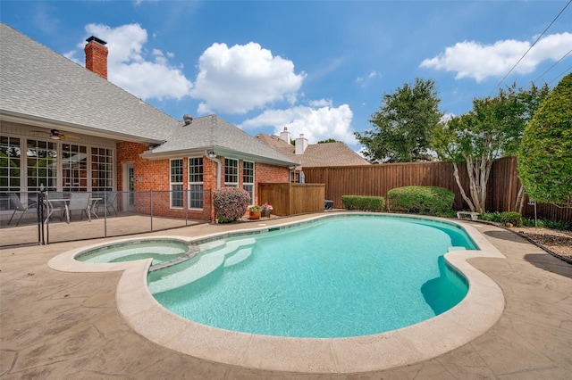 3336 Sage Brush Trl, Plano, TX 75023 - view of swimming pool featuring a fenced backyard, a patio, and a pool with connected hot tub