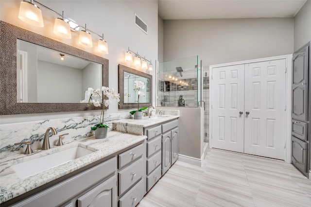 3336 Sage Brush Trl, Plano, TX 75023 - bathroom featuring a stall shower, double vanity, and tile patterned flooring